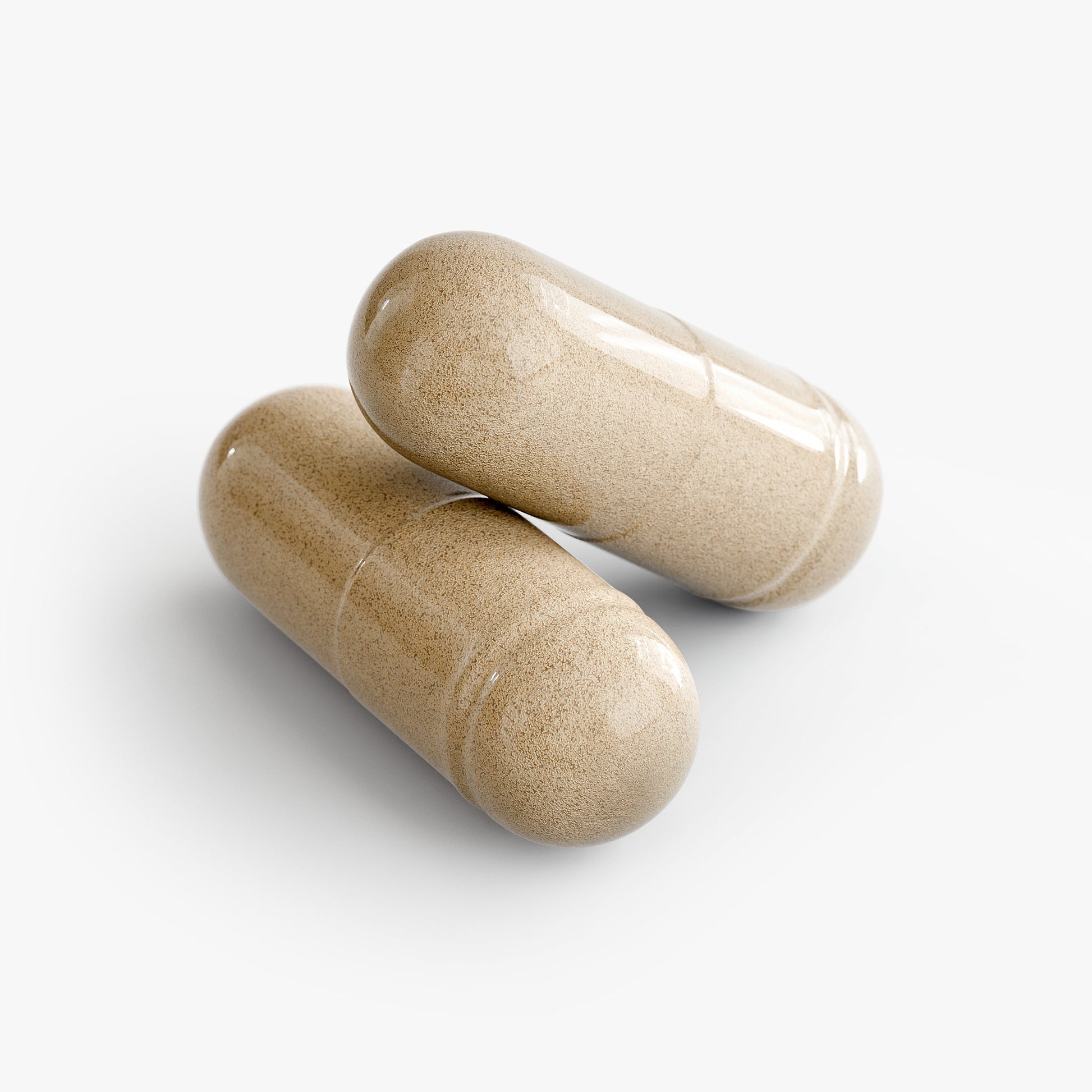 Two Vegetarian Nighttime Supplement Capsules Close Up